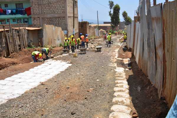 A road being rehabilitated. Young vulnerable women have been invited to apply for scholarships for courses in road construction.